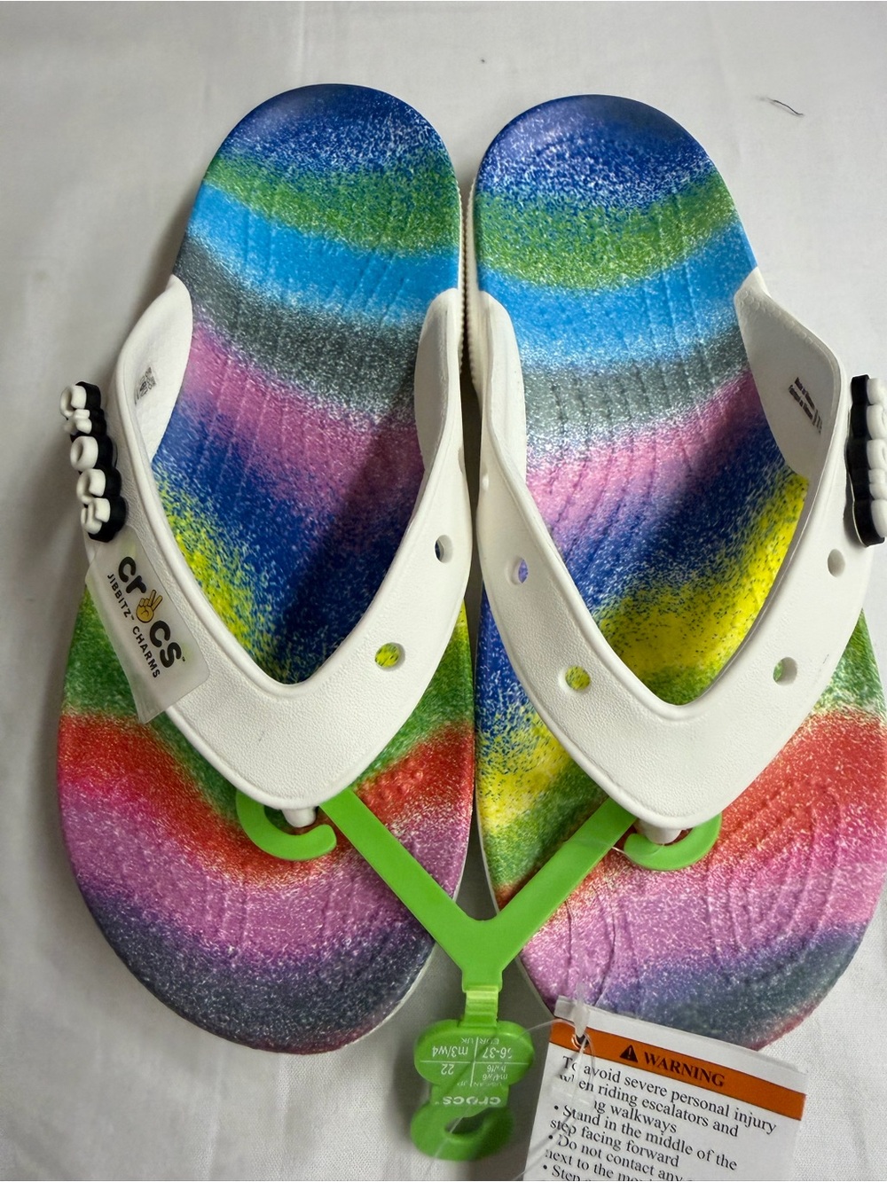 CROCS Kids Rainbow Footbed Flip Flops with White Straps